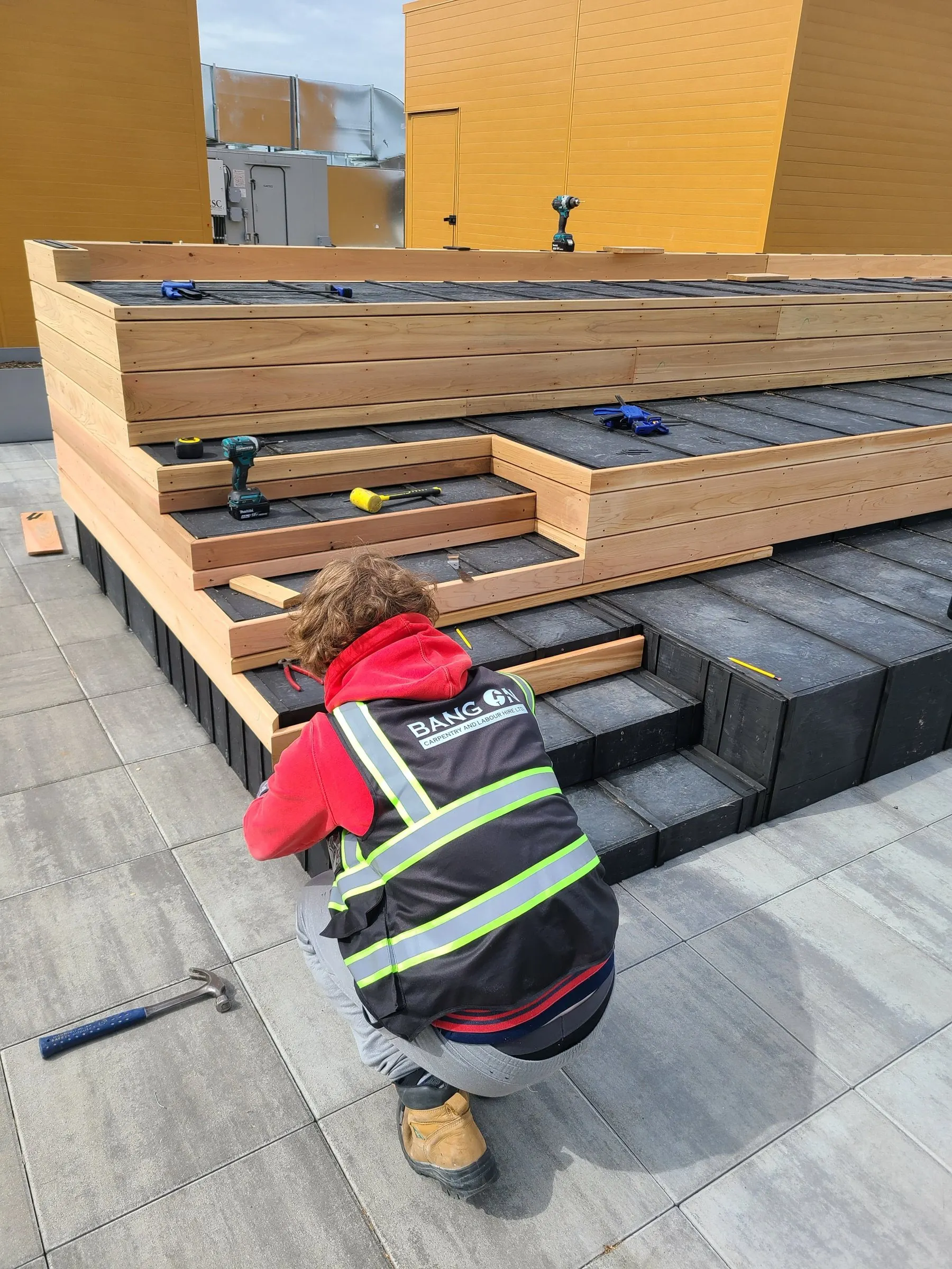 Exterior bench build — Cedar, on site