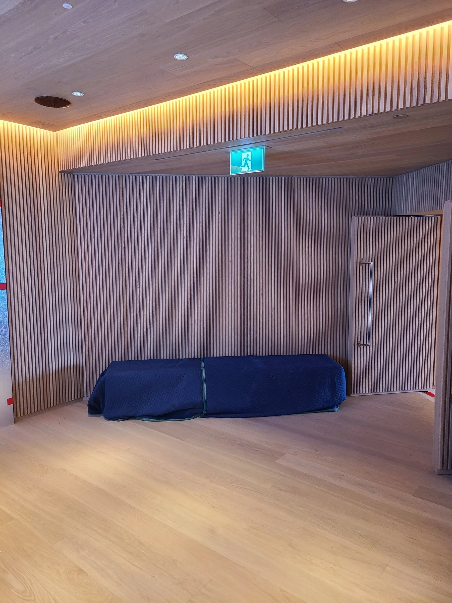 Slat wall with cove light — Commercial interior
